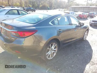 2017 Mazda 6 Touring with VIN JM1GL1V54H1130336, listed as a IAAI auction lot 41586397 with 114,076 mi miles and . Bid and sale history available at DreamBid. Image 4.