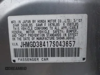 2007 Honda Fit with VIN JHMGD38417S043657, listed as a IAAI auction lot 41025258 with 147,034 mi miles. Bid and sale history available at carsss.com. Image 9.