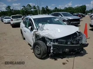 2019 Nissan Sentra S z VIN 3N1AB7AP9KY329164, wystawiony jako Copart lot #59691725 z przebiegiem 158 068 mil mil oraz Szkoda całkowita • Salvage title. Historia ofert i sprzedaży dostępna na DreamBid. Obrazek 14.