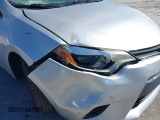 2014 Toyota Corolla L with VIN 2T1BURHE5EC006925, listed as a IAAI auction lot 40917569 with 130,761 mi miles and . Bid and sale history available at DreamBid. Image 6.