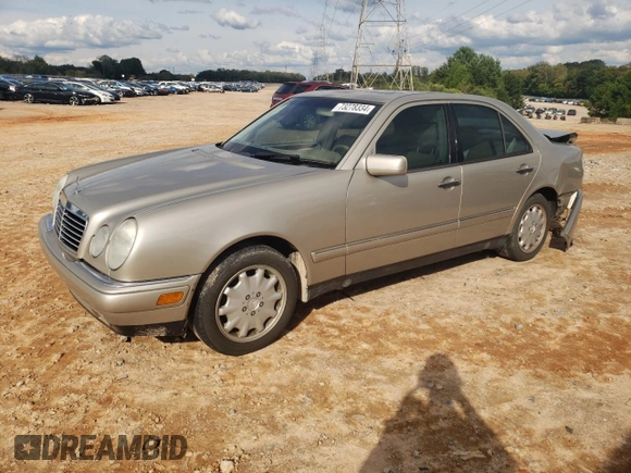 1999 Mercedes-Benz E-Class with VIN WDBJF65HXXA891437, listed as a Copart auction lot 73278334 with 197,159 mi miles and Salvage Title. Bid and sale history available at carsss.com. Image 1.