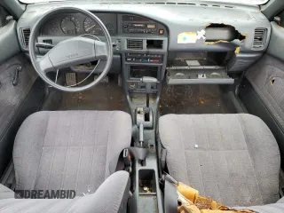 1991 Toyota Corolla z VIN 1NXAE94A0MZ186484, wystawiony jako Copart lot #76421584 z przebiegiem 201 018 mil mil oraz Czysty tytuł • Clean title. Historia ofert i sprzedaży dostępna na DreamBid. Obrazek 8.
