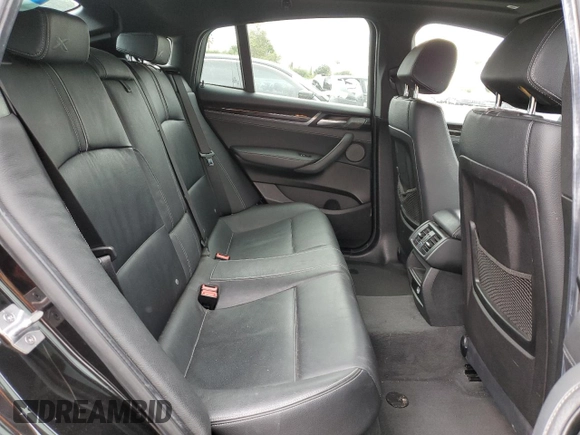 2018 BMW X4 xDrive28i with VIN 5UXXW3C57J0T82047, listed as a Copart auction lot 55988675 with 103,692 mi miles and Salvage title. Bid and sale history available at DreamBid. Image 11.