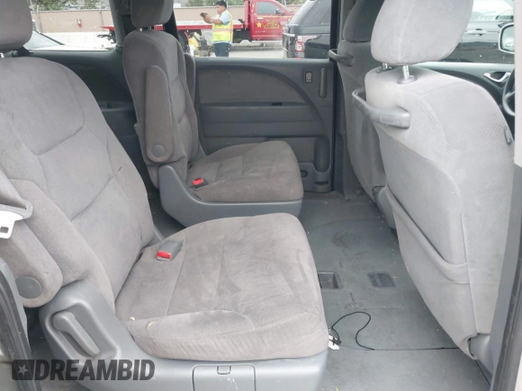2005 Honda Odyssey LX with VIN 5FNRL38205B026824, listed as a IAAI auction lot 42068656 with 140,914 mi miles. Bid and sale history available at carsss.com. Image 8.
