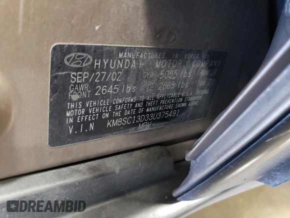2003 Hyundai Santa Fe GLS with VIN KM8SC13D33U375491, listed as a Copart auction lot 76720694 with 212,447 mi miles and Salvage Title. Bid and sale history available at carsss.com. Image 12.