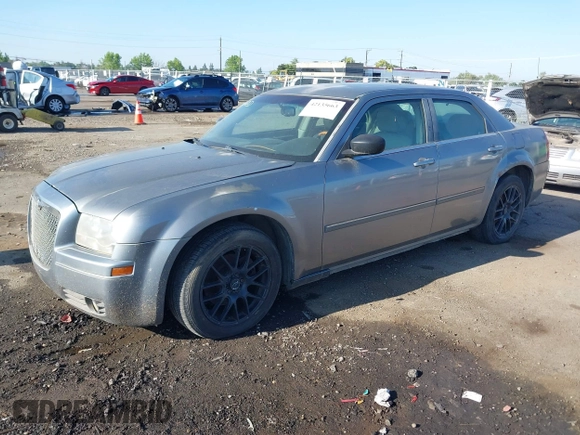 2006 Chrysler 300 Touring with VIN 2C3LA53G66H170047, listed as a IAAI auction lot 42135663 with 215,285 mi miles. Bid and sale history available at carsss.com. Image 2.