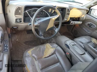1997 GMC Suburban with VIN 3GKFK16RXVG513571, listed as a Copart auction lot 82086924 with 190,142 mi miles and Salvage title. Bid and sale history available at DreamBid. Image 8.