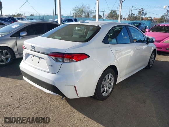 2022 Toyota Corolla LE with VIN 5YFEPMAE3NP276964, listed as a IAAI auction lot 41714701 with 63,597 mi miles. Bid and sale history available at carsss.com. Image 4.