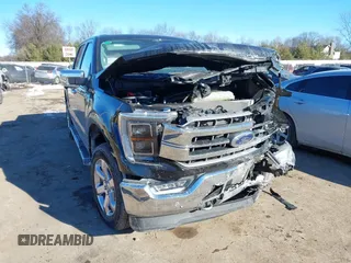 2023 Ford F-150 XL with VIN 1FTFW1E89PFC59073, listed as a IAAI auction lot 41420163 with 14,565 mi miles. Bid and sale history available at carsss.com. Image 1.