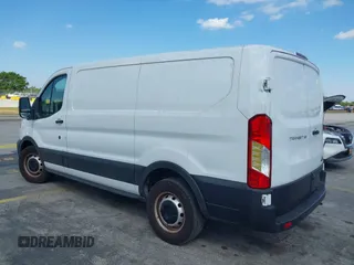 2020 Ford Transit Cargo with VIN 1FTYE1Y8XLKB80973, listed as a IAAI auction lot 41707281 with 112,721 mi miles and . Bid and sale history available at DreamBid. Image 3.