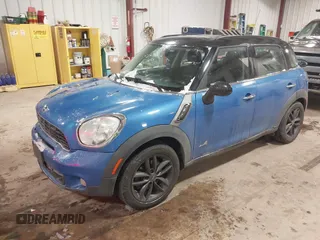 2013 MINI Countryman S ALL4 z VIN WMWZC5C59DWM16261, wystawiony jako IAAI lot #41563270 z przebiegiem 159 516 mil mil oraz . Historia ofert i sprzedaży dostępna na DreamBid. Obrazek 2.
