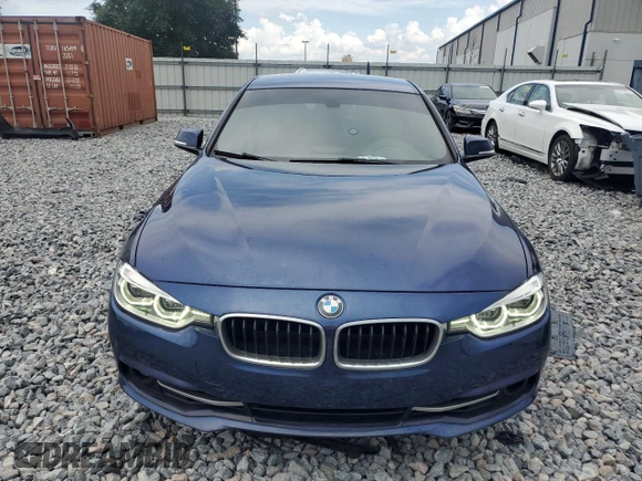 2018 BMW 3 Series 330i xDrive with VIN WBA8D9C54JEM31705, listed as a Copart auction lot 58026075 with 80,344 mi miles and Salvage title. Bid and sale history available at DreamBid. Image 5.