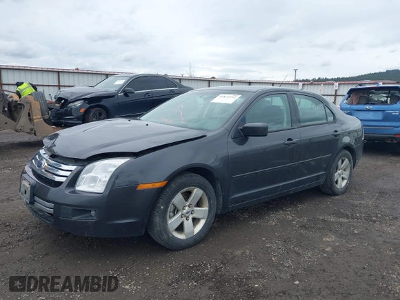 2007 Ford Fusion SE with VIN 3FAHP01187R159869, listed as a IAAI auction lot 41871192 with 173,189 mi miles. Bid and sale history available at carsss.com. Image 2.