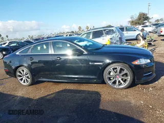 2015 Jaguar XJ with VIN SAJWA1CZ2F8V84677, listed as a IAAI auction lot 41723372 with 52,888 mi miles. Bid and sale history available at carsss.com. Image 13.