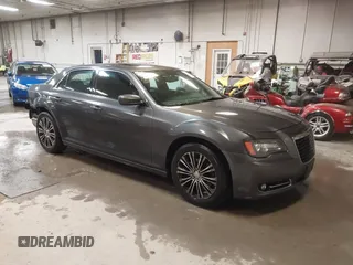 2014 Chrysler 300 with VIN 2C3CCAGG0EH179435, listed as a IAAI auction lot 41202319 with 149,410 mi miles. Bid and sale history available at carsss.com. Image 1.