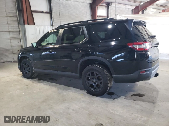 2023 Honda Pilot TrailSport with VIN 5FNYG1H63PB031249, listed as a Copart auction lot 85163934 with 12,058 mi miles and Salvage Title. Bid and sale history available at carsss.com. Image 2.