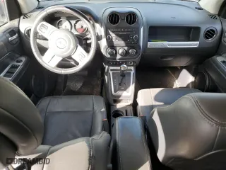 2016 Jeep Compass High Altitude Edition with VIN 1C4NJCEA6GD720251, listed as a Copart auction lot 42423475 with 103,312 mi miles and Salvage Title. Bid and sale history available at carsss.com. Image 8.