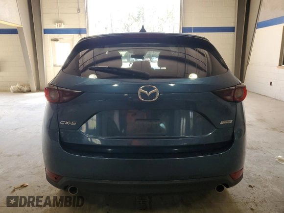 2018 Mazda CX-5 Touring with VIN JM3KFACM9J1445724, listed as a Copart auction lot 50469245 with 0 mi miles and Salvage Title. Bid and sale history available at carsss.com. Image 6.