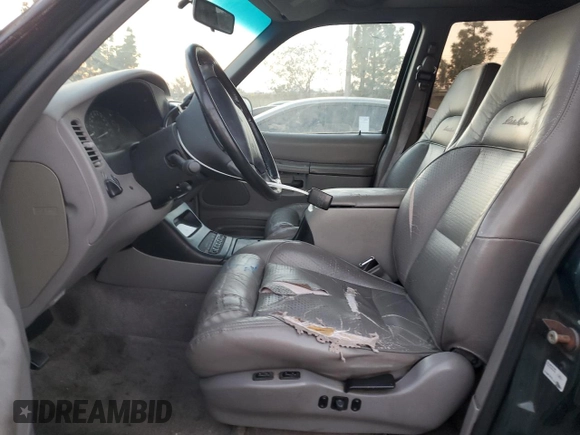 1995 Ford Explorer Eddie Bauer z VIN 1FMDU32X0SZB44174, wystawiony jako Copart lot #86865604 z przebiegiem 79 354 mil mil oraz Czysty tytuł • Clean title. Historia ofert i sprzedaży dostępna na DreamBid. Obrazek 7.