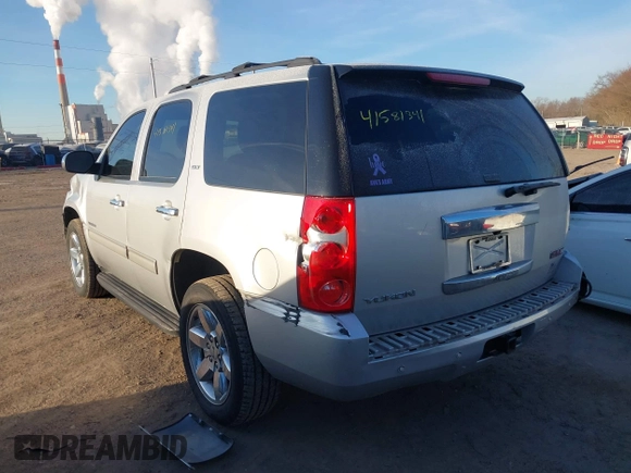 2014 GMC Yukon SLT with VIN 1GKS2CE00ER225071, listed as a IAAI auction lot 41581341 with 113,212 mi miles. Bid and sale history available at carsss.com. Image 3.