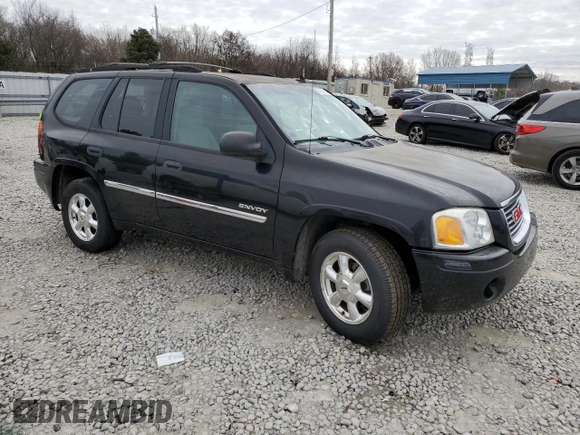 2006 GMC Envoy SLT with VIN 1GKDS13SX62354690, listed as a Copart auction lot 84138814 with 194,669 mi miles and Salvage Title. Bid and sale history available at carsss.com. Image 4.