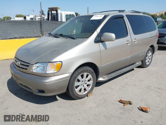 2002 Toyota Sienna LE with VIN 4T3ZF13C72U473555, listed as a IAAI auction lot 42426344 with 330,911 mi miles and . Bid and sale history available at DreamBid. Image 2.