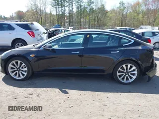 2018 Tesla Model 3 Long Range Battery z VIN 5YJ3E1EB6JF086612, wystawiony jako IAAI lot #42149440 z przebiegiem 101 170 mil mil oraz . Historia ofert i sprzedaży dostępna na DreamBid. Obrazek 14.