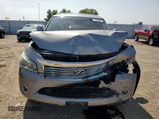 2012 Infiniti QX56 7-passenger with VIN JN8AZ2NE9C9016258, listed as a Copart auction lot 71570824 with 142,859 mi miles and Salvage Title. Bid and sale history available at carsss.com. Image 5.