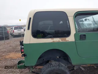 1995 Jeep Wrangler with VIN 1J4FY29S9SP274563, listed as a IAAI auction lot 41732557 with 76,540 mi miles. Bid and sale history available at carsss.com. Image 8.