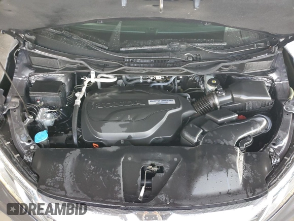 2019 Honda Odyssey EX-L with VIN 5FNRL6H71KB126181, listed as a Copart auction lot 77083064 with 48,590 mi miles and Salvage Title. Bid and sale history available at DreamBid. Image 12.