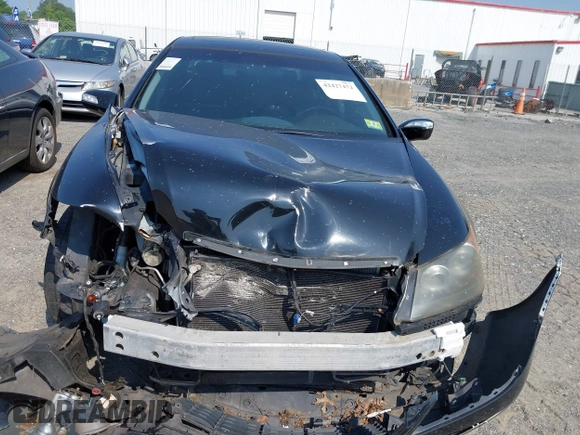 2006 Acura RL z VIN JH4KB16556C012209, wystawiony jako IAAI lot #42427472 z przebiegiem Nie podano mil oraz . Historia ofert i sprzedaży dostępna na DreamBid. Obrazek 10.