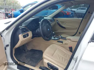 2014 BMW 3 Series 328i xDrive with VIN WBA3B5C56EP544400, listed as a IAAI auction lot 42172100 with 242,472 mi miles. Bid and sale history available at carsss.com. Image 5.