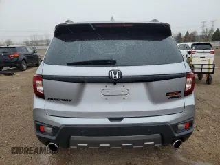 2023 Honda Passport TrailSport with VIN 5FNYF8H64PB044233, listed as a Copart auction lot 53522015 with 10,458 mi miles and Salvage title. Bid and sale history available at DreamBid. Image 6.