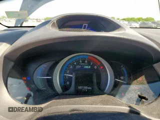 2010 Honda Insight LX with VIN JHMZE2H56AS042097, listed as a Copart auction lot 53972215 with 107,182 mi miles and Salvage Title. Bid and sale history available at DreamBid. Image 9.