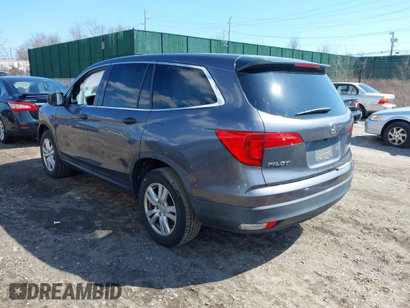 2016 Honda Pilot LX with VIN 5FNYF6H14GB082537, listed as a IAAI auction lot 41864525 with 137,097 mi miles. Bid and sale history available at carsss.com. Image 3.