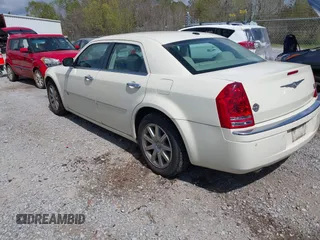 2010 Chrysler 300 C Hemi with VIN 2C3CA6CT6AH114461, listed as a IAAI auction lot 41779993 with 126,898 mi miles and . Bid and sale history available at carsss.com. Image 3.