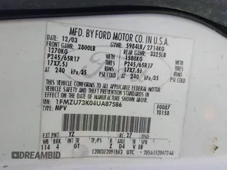 2004 Ford Explorer XLT z VIN 1FMZU73K04UA87586, wystawiony jako IAAI lot #42576434 z przebiegiem Nie podano mil oraz . Historia ofert i sprzedaży dostępna na DreamBid. Obrazek 9.