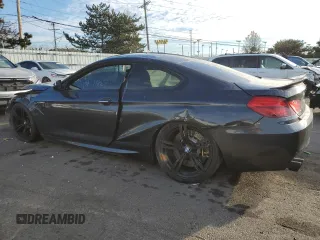 2015 BMW M6 z VIN WBSLX9C52FD160752, wystawiony jako Copart lot #83657994 z przebiegiem Nie podano mil oraz Czysty tytuł • Clean title. Historia ofert i sprzedaży dostępna na DreamBid. Obrazek 2.