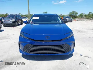 2025 Toyota Camry LE with VIN 4T1DAACK3SU104152, listed as a IAAI auction lot 42039337 with 1,423 mi miles and . Bid and sale history available at DreamBid. Image 12.