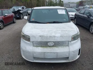 2009 Scion xB with VIN JTLKE50E491061737, listed as a IAAI auction lot 42174031 with 206,026 mi miles. Bid and sale history available at carsss.com. Image 6.