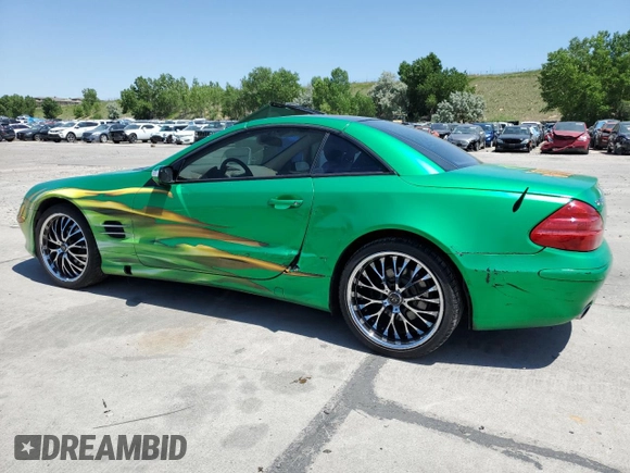 2006 Mercedes-Benz SL 500 with VIN WDBSK75F06F109541, listed as a Copart auction lot 61430545 with 106,428 mi miles and Salvage title. Bid and sale history available at DreamBid. Image 2.