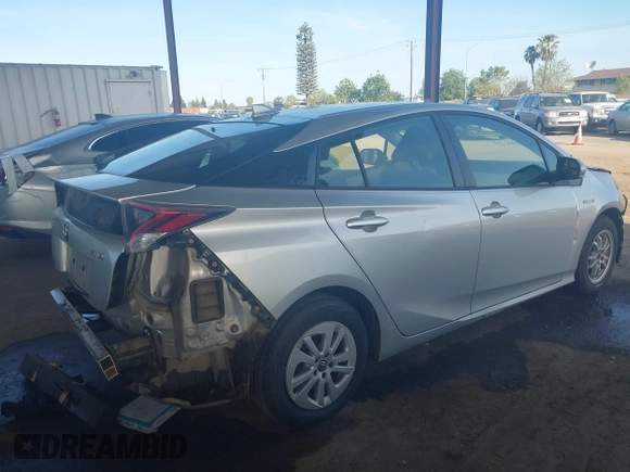 2016 Toyota Prius Two with VIN JTDKBRFU0G3505479, listed as a IAAI auction lot 41977008 with 218,630 mi miles and . Bid and sale history available at DreamBid. Image 4.