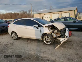 2017 Ford Fiesta Titanium with VIN 3FADP4CJ9HM136313, listed as a Copart auction lot 82610884 with Not Provided miles and Salvage Title. Bid and sale history available at DreamBid. Image 4.