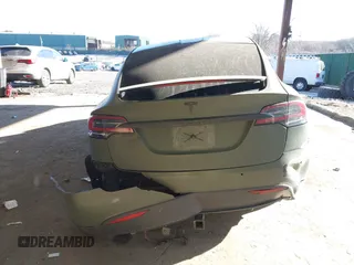 2020 Tesla Model X Long Range with VIN 5YJXCDE24LF272242, listed as a IAAI auction lot 41275226 with 103,731 mi miles. Bid and sale history available at carsss.com. Image 16.