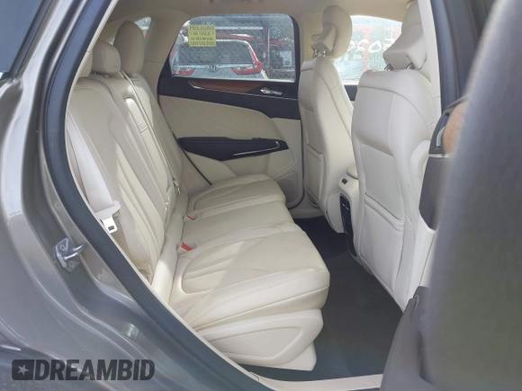 2016 Lincoln MKC Reserve with VIN 5LMTJ3DH0GUJ03524, listed as a IAAI auction lot 41405020 with 59,469 mi miles and . Bid and sale history available at DreamBid. Image 8.