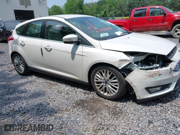 2016 Ford Focus Titanium with VIN 1FADP3N26GL332709, listed as a IAAI auction lot 42458997 with 75,509 mi miles and . Bid and sale history available at DreamBid. Image 1.