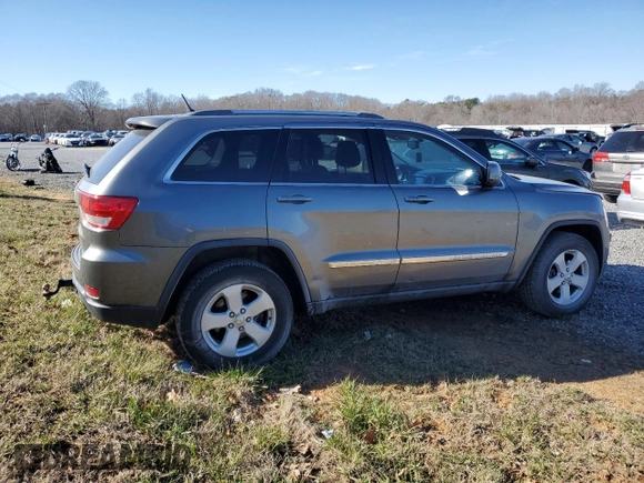 2012 Jeep Grand Cherokee Laredo with VIN 1C4RJFAG7CC299315, listed as a Copart auction lot 46174745 with 152,256 mi miles and Salvage Title. Bid and sale history available at carsss.com. Image 3.