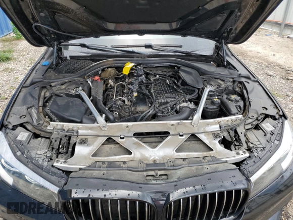 2019 BMW 7 Series 740i with VIN WBA7E2C57KB217455, listed as a Copart auction lot 69580773 with 74,717 mi miles and . Bid and sale history available at DreamBid. Image 11.
