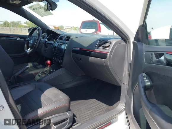 2017 Volkswagen Jetta GLI z VIN 3VW5T7AJ3HM257978, wystawiony jako IAAI lot #41855055 z przebiegiem 177 344 mil mil oraz . Historia ofert i sprzedaży dostępna na DreamBid. Obrazek 5.