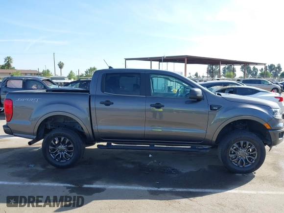 2020 Ford Ranger XL z VIN 1FTER4FHXLLA99641, wystawiony jako IAAI lot #42094134 z przebiegiem 49 788 mil mil oraz . Historia ofert i sprzedaży dostępna na DreamBid. Obrazek 13.